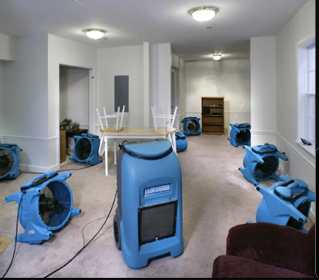 Air movers and dehumidifier setup for Water Damage Restoration in Woolwich